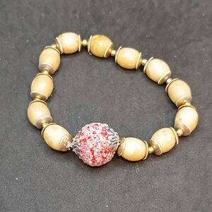Elegant Beaded Bracelet with Red Accent